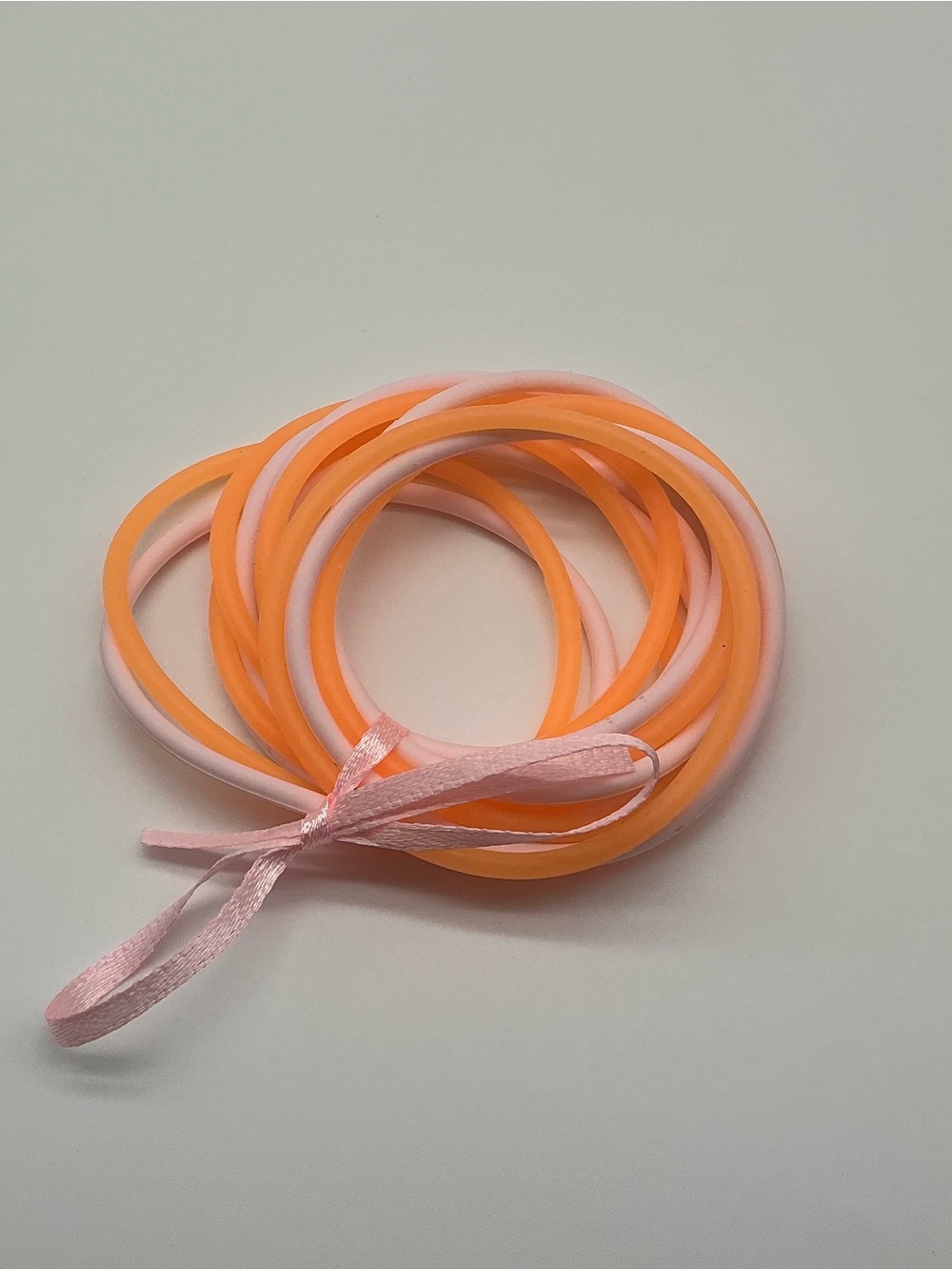Set of 12 Orange and Pastel Pink Jelly Bracelets